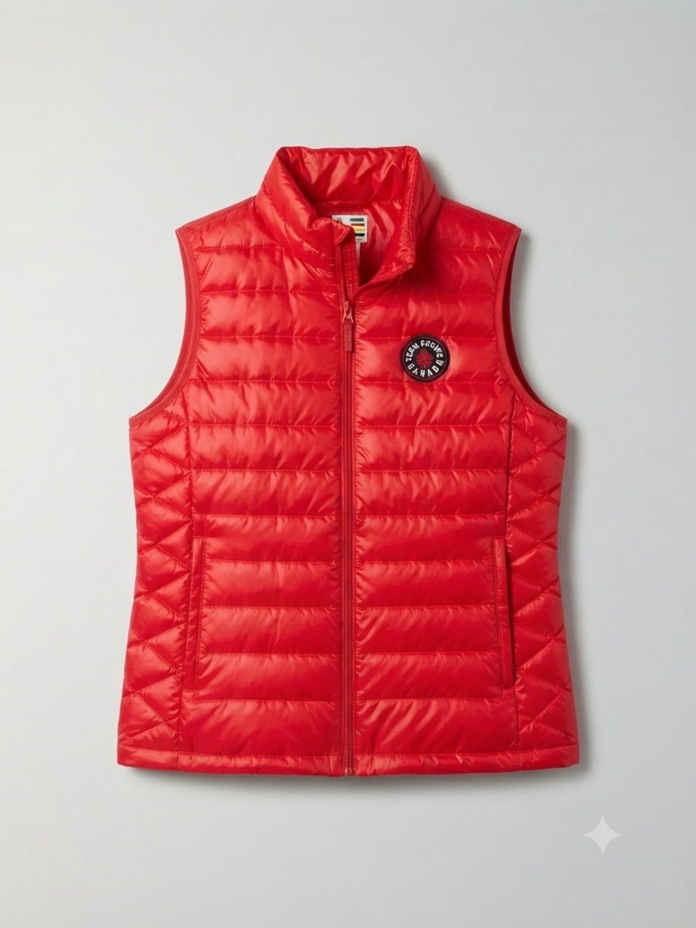 Team Canada Olympic down-filled puffer vest by Hudson's Bay.
